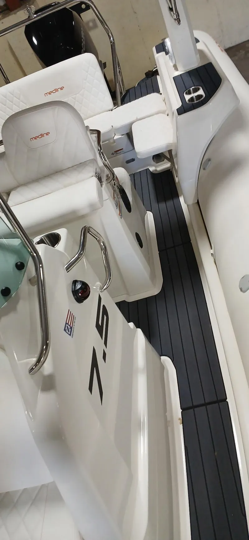 Slide: The Image of 2025 Zodiac Medline 7.5 GT boat interior with sleek design and modern features. - 8