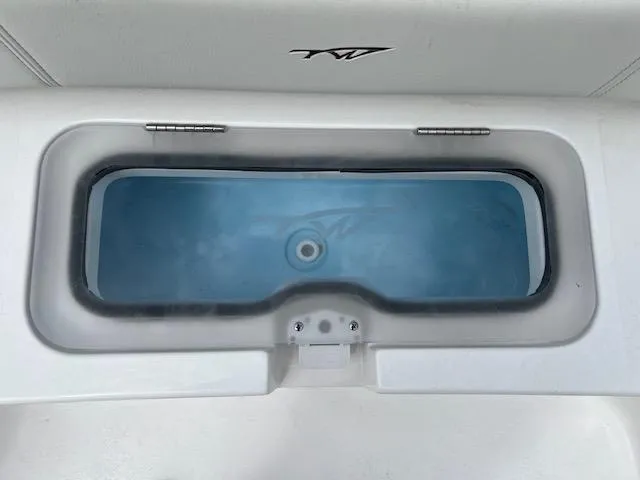 Slide: The Image of Livewell on 2025 Tidewater 3100 Carolina Bay boat, featuring sleek design and functionality. - 5