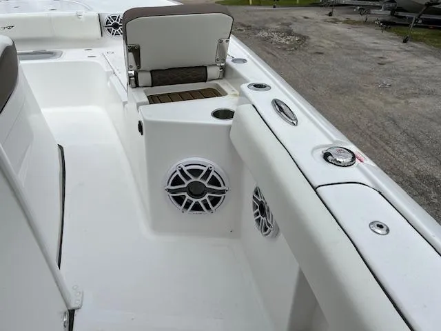 Slide: The Image of 2025 Tidewater 3100 Carolina Bay boat interior with seating and speakers. - 6