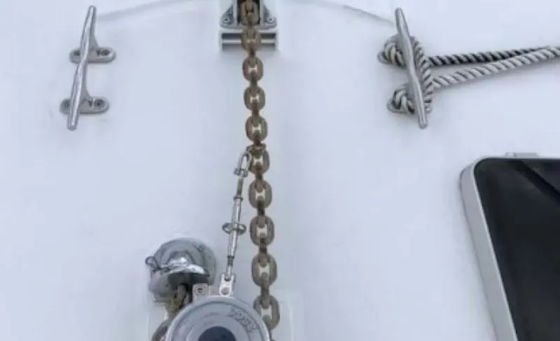 Slide: The Image of Anchor chain and winch on 1993 Palmer Johnson Sportfish yacht deck. - 14