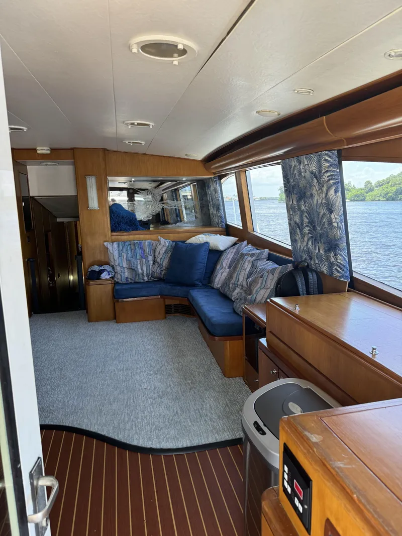 Slide: The Image of Luxurious interior of 1993 Palmer Johnson Sportfish yacht with plush seating and scenic water views. - 16