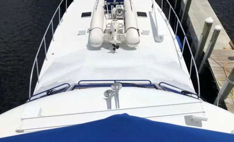 Slide: The Image of Palmer Johnson Sportfish 1993 yacht docked, aerial view of deck and equipment. - 5