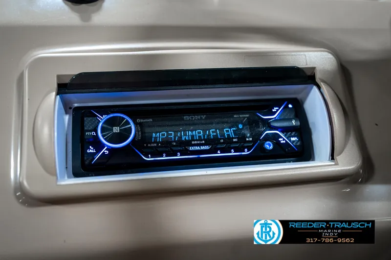 Slide: The Image of Sony stereo system in a 2016 Bennington 20 SLMX boat dashboard. - 33