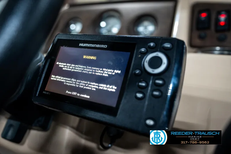 Slide: The Image of Humminbird device on 2016 Bennington 20 SLMX dashboard with warning message displayed. - 38