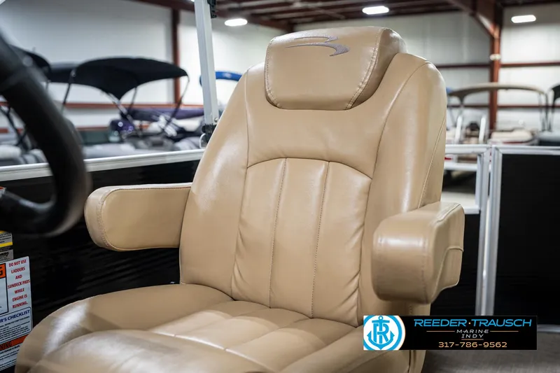 Slide: The Image of Luxurious tan captain's chair in a 2016 Bennington 20 SLMX boat. - 39