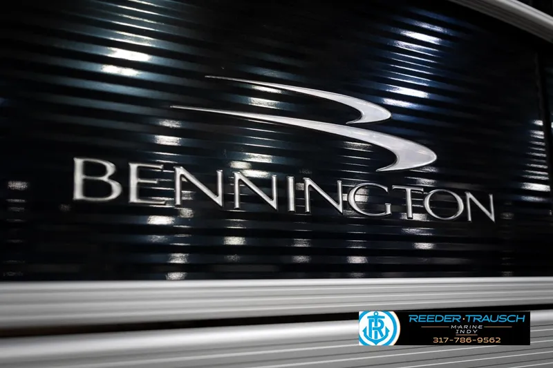 Slide: The Image of 2016 Bennington 20 SLMX logo on a sleek, reflective surface. - 47