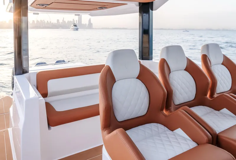 Slide: The Image of Luxurious seating on 2025 Oryx 37 FX boat with ocean view. - 12