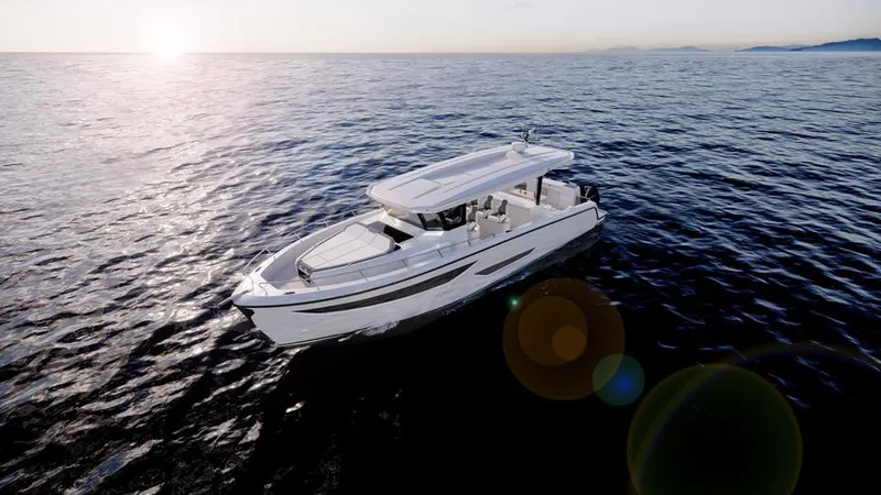 Slide: The Image of 2025 Oryx 37 FX yacht cruising on open sea at sunset. - 17