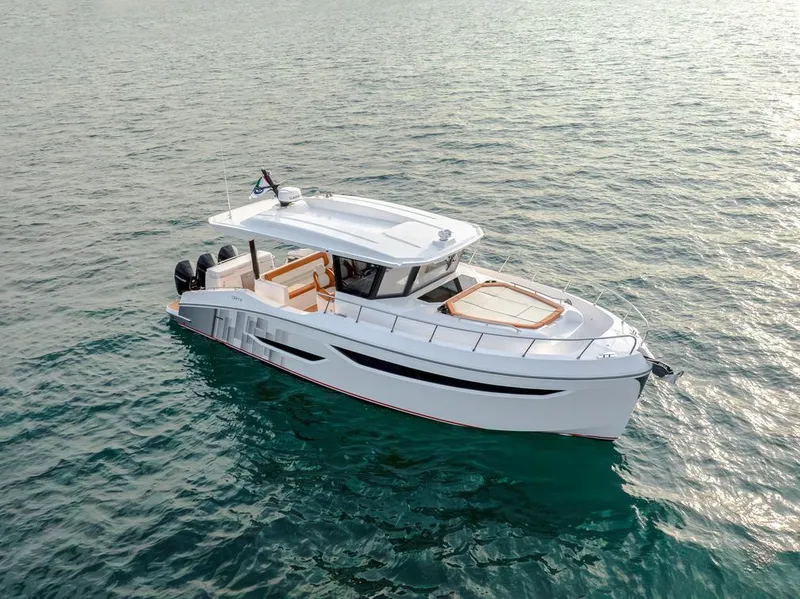 The Image of 2025 Oryx 37 FX boat on calm water, showcasing sleek design and modern features. - 1