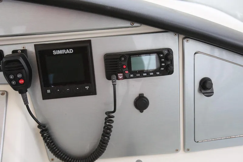 Slide: The Image of Control panel of 2012 Carver 38 Super Sport with Simrad electronics. - 25