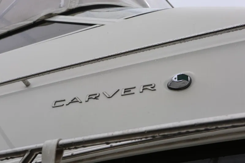 Slide: The Image of Carver 38 Super Sport 2012 boat with logo on the side. - 9
