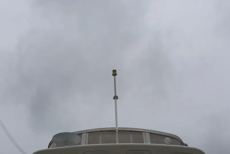 Slide: The Image of Carver 38 Super Sport 2012 boat against cloudy sky, viewed from below. - 19