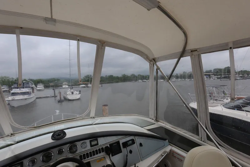 Slide: The Image of Interior view of 2012 Carver 38 Super Sport yacht at marina. - 31