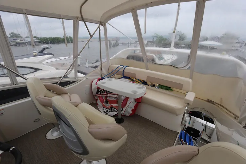 Slide: The Image of Interior of 2012 Carver 38 Super Sport yacht with seating and table. - 41