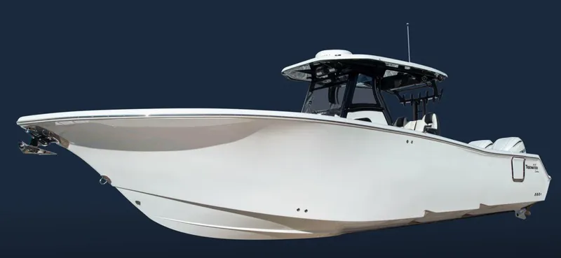 The Image of 2026 Tidewater 302 CC boat, sleek white design, side view on dark background. - 1