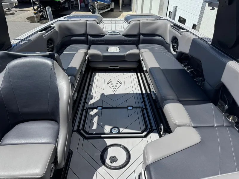 Slide: The Image of 2020 Supra SE550 boat interior with luxurious seating and modern design. - 6