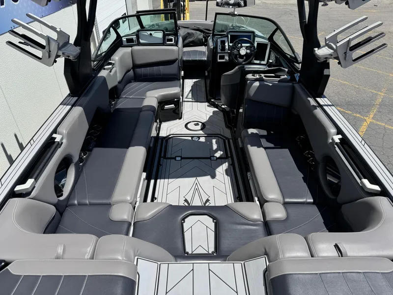 Slide: The Image of 2020 Supra SE550 boat interior with spacious seating and modern design. - 7