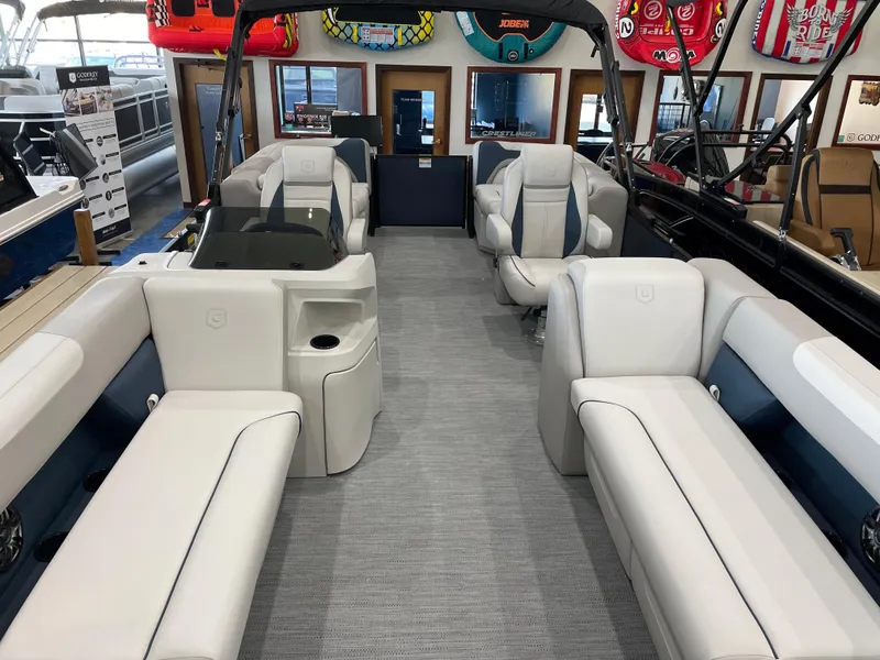 Slide: The Image of 2025 Godfrey SWEETWATER 2286 SB pontoon boat interior with luxurious seating and modern design. - 5