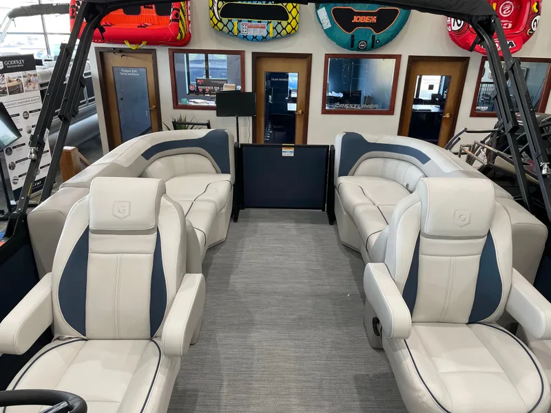 Slide: The Image of 2025 Godfrey SWEETWATER 2286 SB pontoon boat interior with plush seating and modern design. - 8