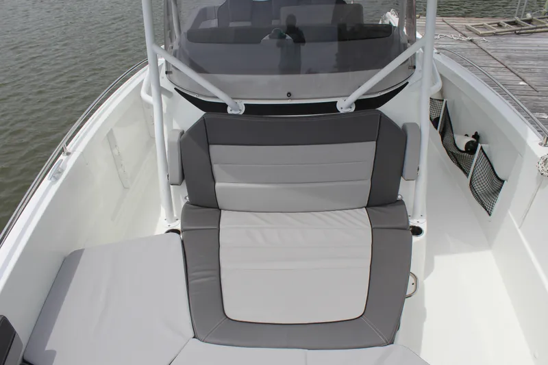 Slide: The Image of Jeanneau Leader 9.0 CC 2023 storage compartment with open lid. - 47