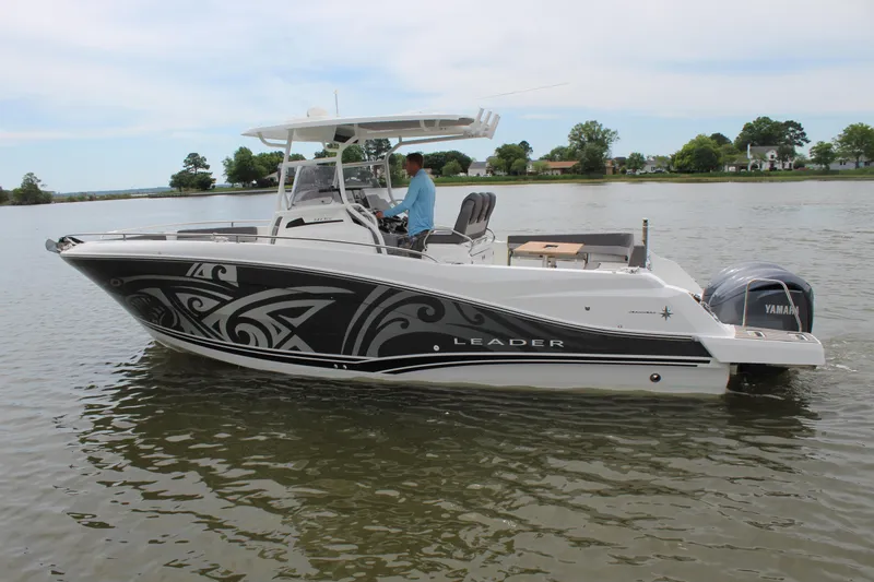 Slide: The Image of Jeanneau Leader 9.0 CC 2023 in harbor, modern design, Yamaha engine. - 6