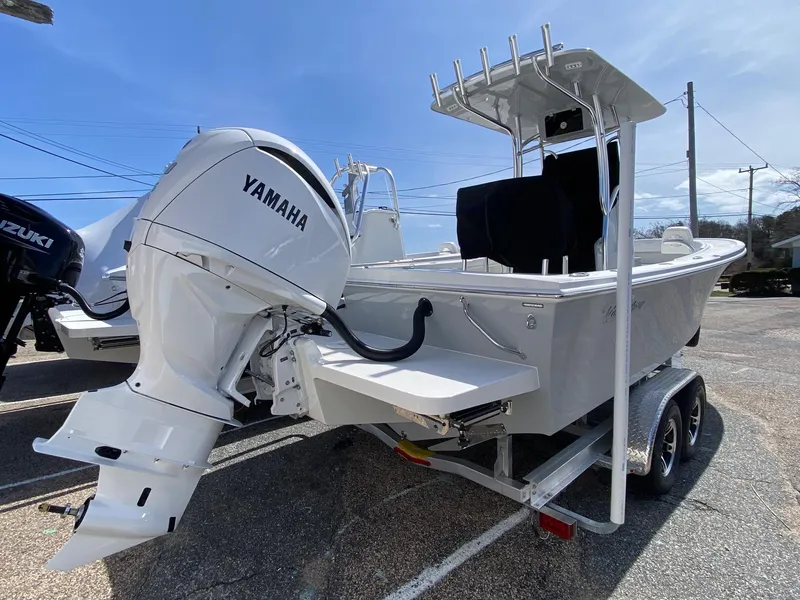 Slide: The Image of 2025 Pair Customs 21 Center Console DV boat with Yamaha outboard engine on trailer. - 7