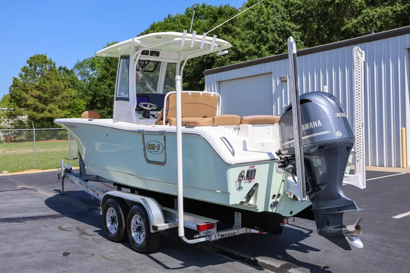 Slide: The Image of 2019 Sea Hunt Ultra 255 SE boat with Yamaha 300 engine on trailer. - 3