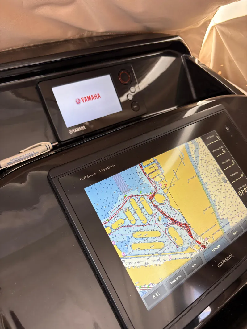 Slide: The Image of Garmin navigation system on 2018 Jeanneau Merry Fisher 855 boat dashboard. - 28