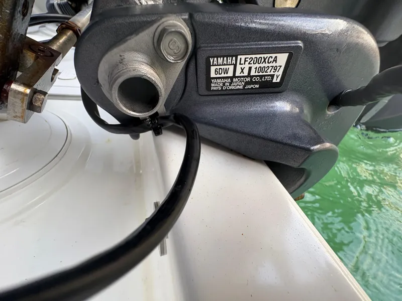 Slide: The Image of Outboard motor detail on 2018 Jeanneau Merry Fisher 855 boat, featuring Yamaha LF200XCA. - 29