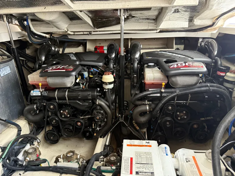 Slide: The Image of Engine compartment of a 2008 Sea Ray 330 Sundancer with twin 496 Magnum engines. - 46