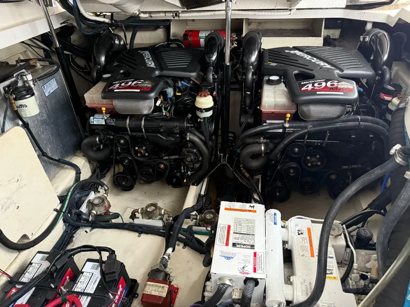 Slide: The Image of Engine room of 2008 Sea Ray 330 Sundancer with twin MerCruiser 496 engines. - 47