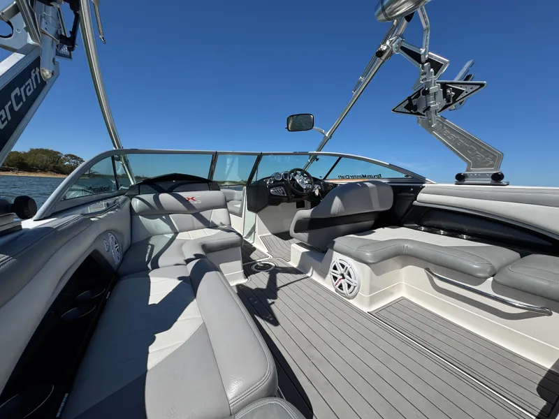 Slide: The Image of 2008 MasterCraft X45 boat interior with gray seating and sleek design. - 17