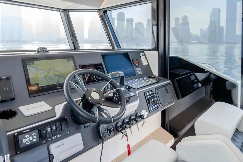 Slide: The Image of Modern helm of 2025 Oryx 47 LX yacht with advanced navigation systems. - 6