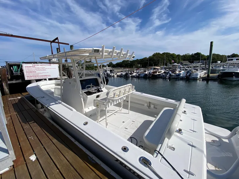 Slide: The Image of Control console of a 2004 Jupiter 31 FS boat. - 10