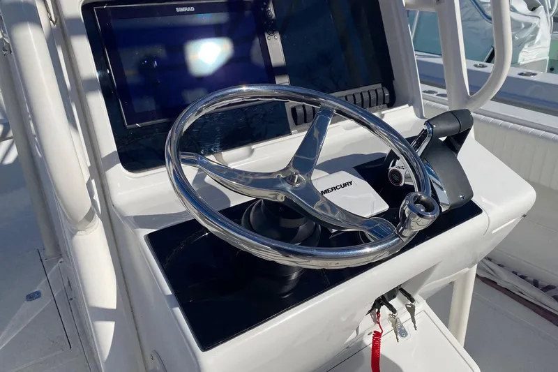 Slide: The Image of 2004 Jupiter 31 FS boat with Mercury engines, side view. - 21