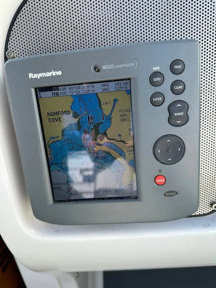 Slide: The Image of Raymarine GPS display on 2003 Chris-Craft 28' Corsair, showing Mumford Cove navigation map. - 20