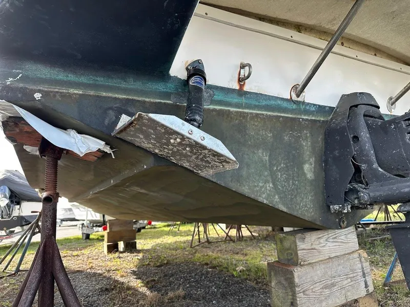 Slide: The Image of 2003 Chris-Craft 28' Corsair boat hull on blocks, showing underside details. - 31