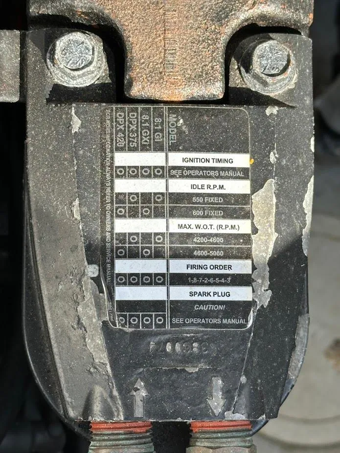 Slide: The Image of Engine specifications label on a 2003 Chris-Craft 28' Corsair boat. - 8