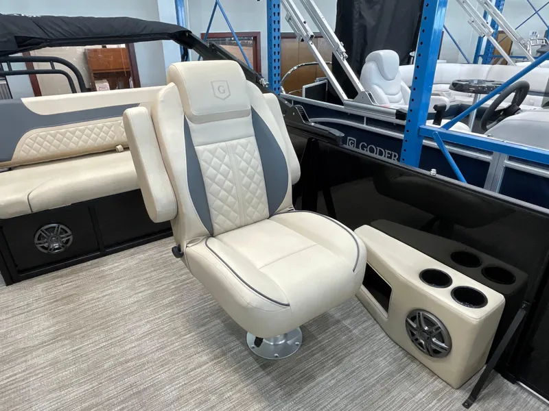 Slide: The Image of Luxurious seating on 2025 Godfrey SW2286SFLC Tritoon with cup holders and speaker system. - 7
