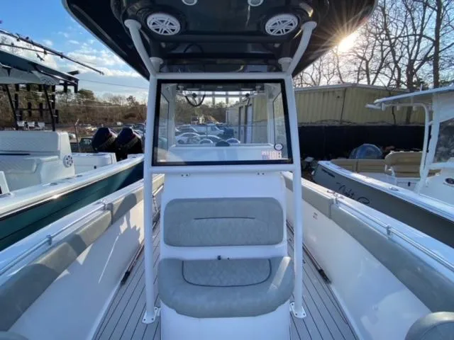 Slide: The Image of 2020 Sportsman Heritage 251 Center Console boat with seating and console view. - 13