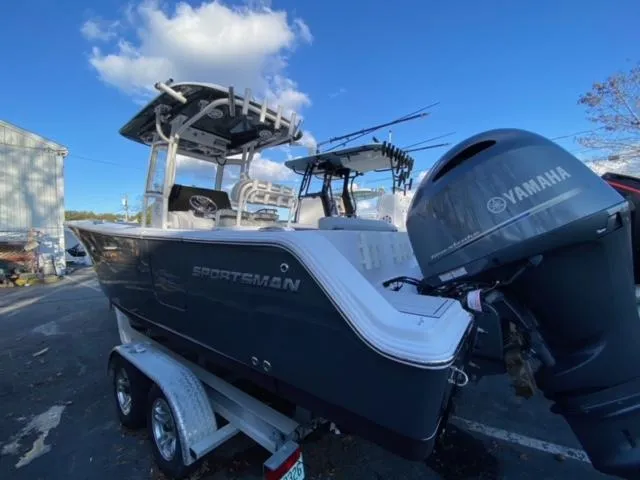 Slide: The Image of 2020 Sportsman Heritage 251 Center Console boat with Yamaha engine on trailer. - 3