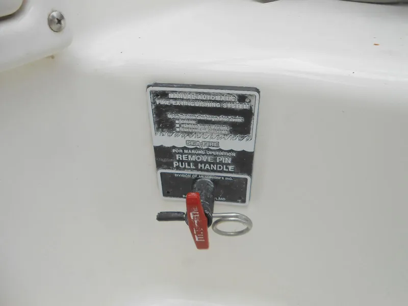 Slide: The Image of Fire extinguisher system handle on 2008 Sea Ray 260 Sundancer boat. - 6