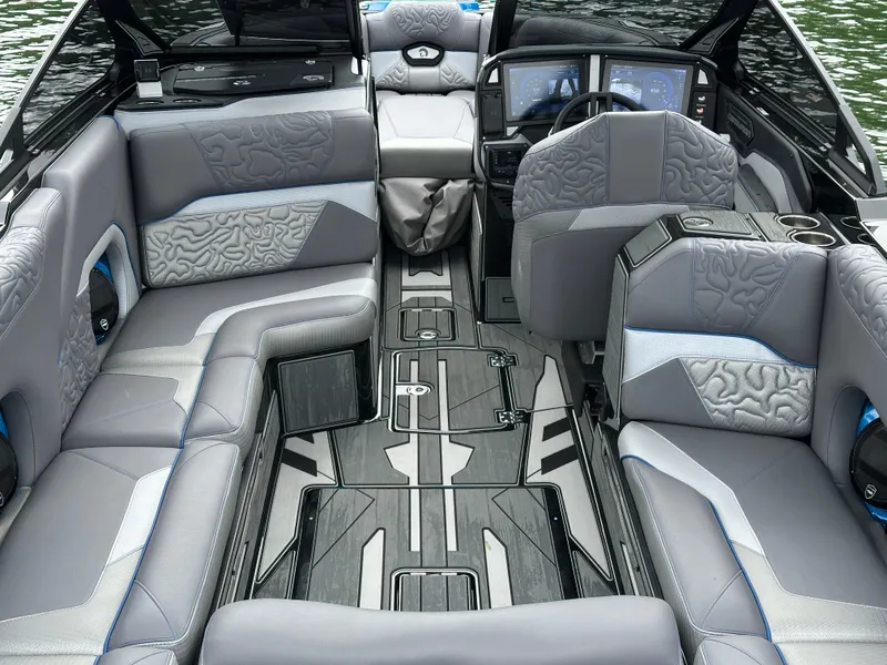 Slide: The Image of Luxurious interior of 2025 Centurion Ri245 boat with modern seating and sleek design. - 15