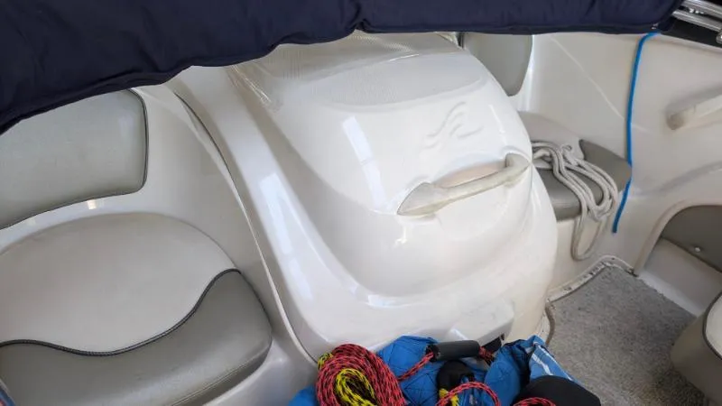 Slide: The Image of Interior of a 2005 Sea Ray 180 Sport boat with seating and equipment. - 7