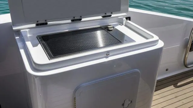 Slide: The Image of Outdoor grill on a 2025 Oryx 379 yacht deck, near water. - 13