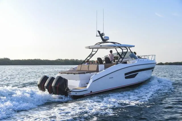 Slide: The Image of Luxury Oryx 379 yacht cruising on open water, 2025 model. - 2