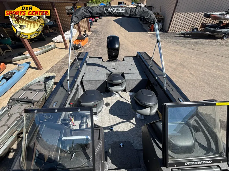 Slide: The Image of 2023 Tracker Targa V-18 Combo boat at D&R Sports Center, featuring spacious seating and modern design. - 6