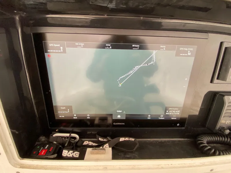Slide: The Image of Garmin navigation display on 2007 Regulator 29 Forward Seating boat dashboard. - 14