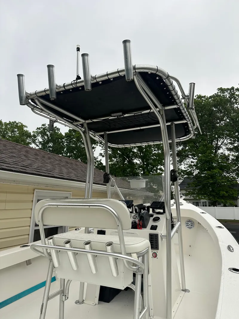 Slide: The Image of 2015 Allied 17 Explorer boat with T-top and rod holders. - 15