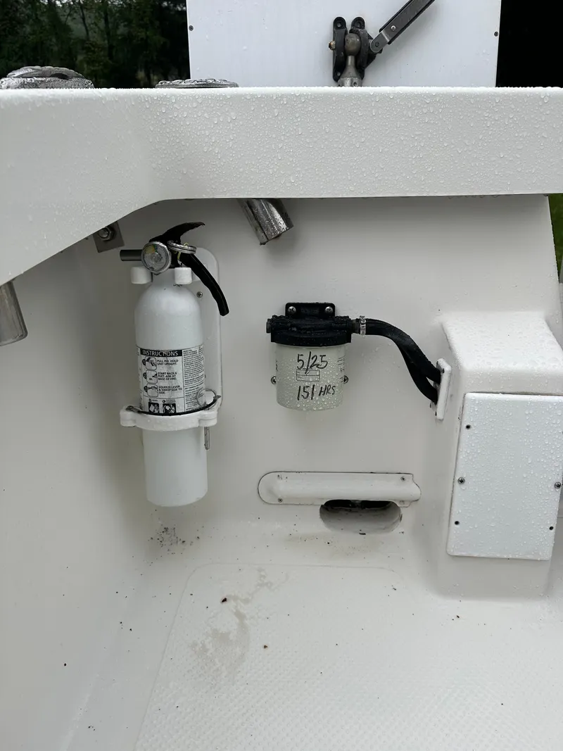 Slide: The Image of 2015 Allied 17 Explorer boat interior with fire extinguisher and equipment. - 26